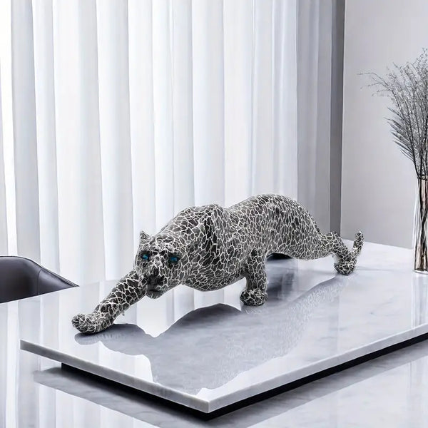 Decorative leopard sculpture on a white surface with a modern interior  background decor auraworks