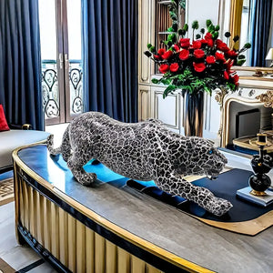 Decorative leopard sculpture on a white surface with a modern interior  background decor auraworks
