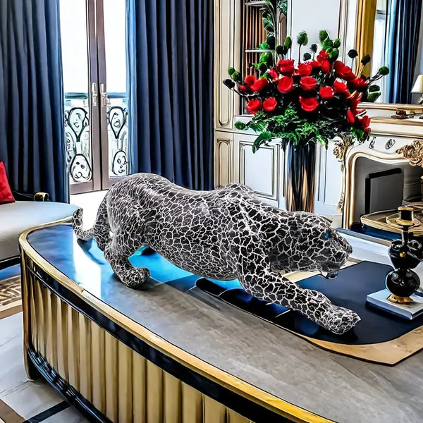 Decorative leopard sculpture on a white surface with a modern interior  background decor auraworks