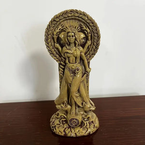Decorative figurine of a woman with a wreath on a wooden surface auraworks decor