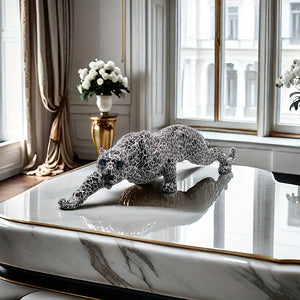 Decorative leopard sculpture on a white surface with a modern interior  background decor auraworks