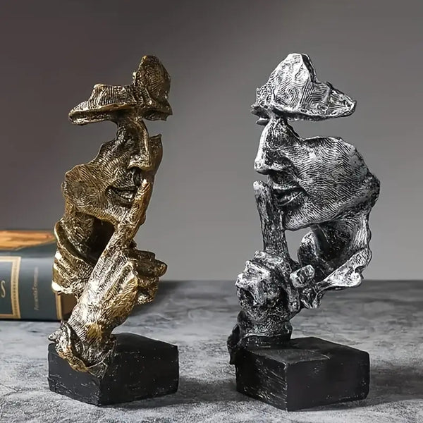 Abstract Broken Face Expressions Sculpture Set of faces on a book with a gray background auraworks decor