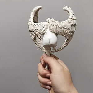 Winged Grace Angel statue in white resin, sitting elegant spiritual home decor. Auraworks