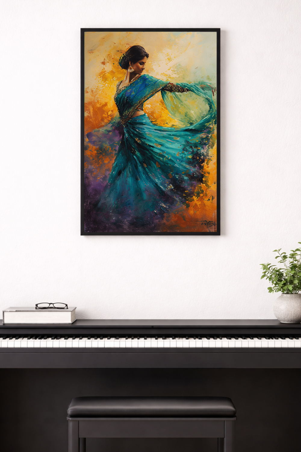 Framed painting of a woman in a blue saree against an orange and yellow background