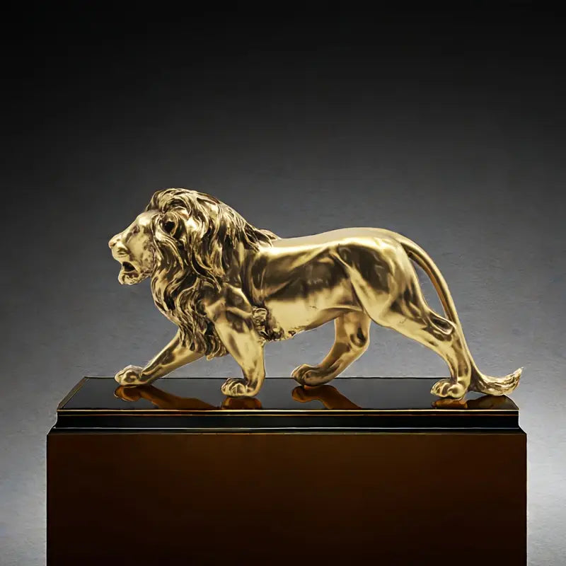 Gold lion statue on a table with a vase and branches in the background decor auraworks