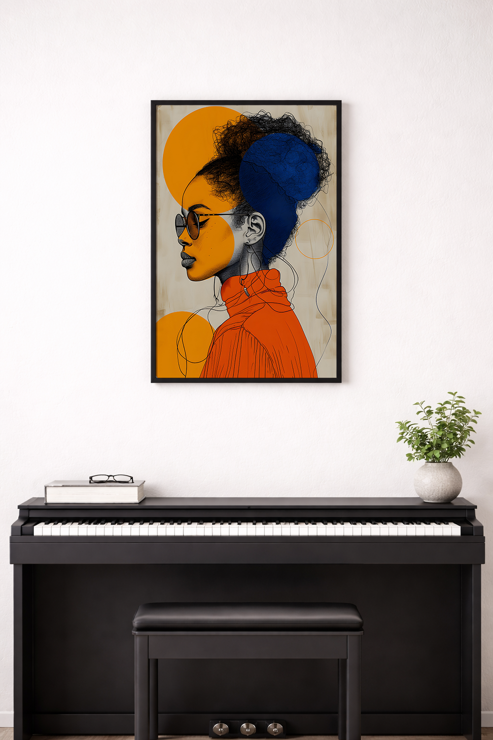 Framed artwork of a stylized portrait with a person wearing sunglasses and an orange outfit, set against a white background.