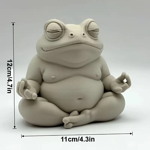 Ceramic frog statue in a meditative pose with measurements on a white background