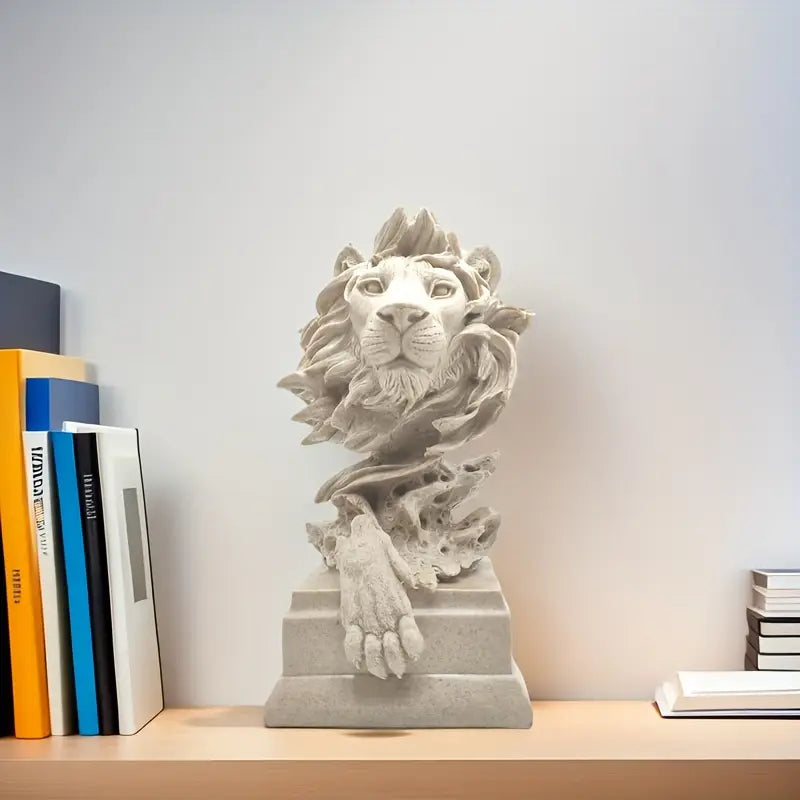 Decorative lion head sculpture on a shelf with books auraworks decor