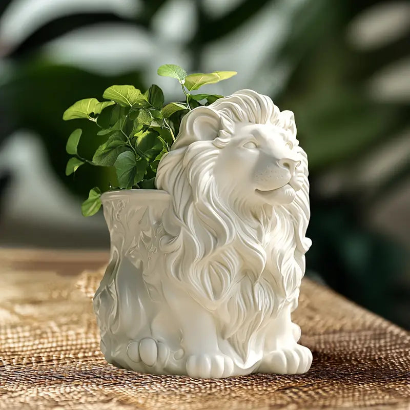White lion-shaped planter with a plant on a textured surface auraworks pot vase 