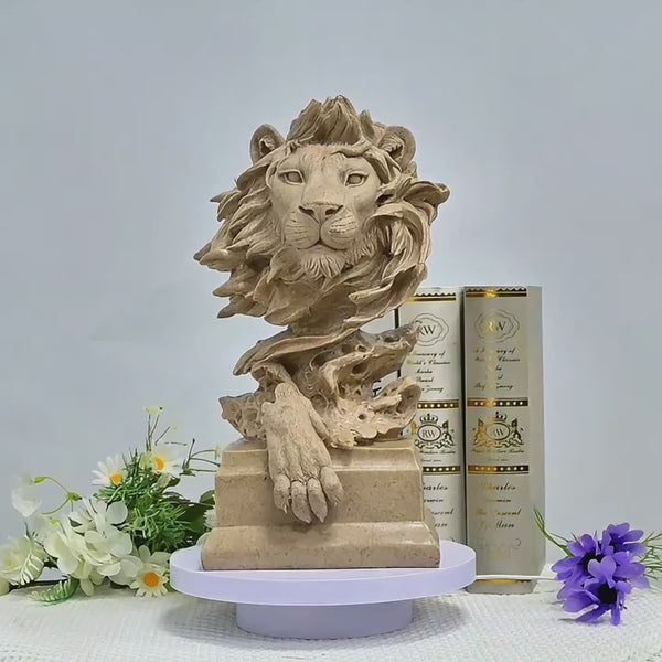 Decorative lion head sculpture on a shelf with books auraworks decor